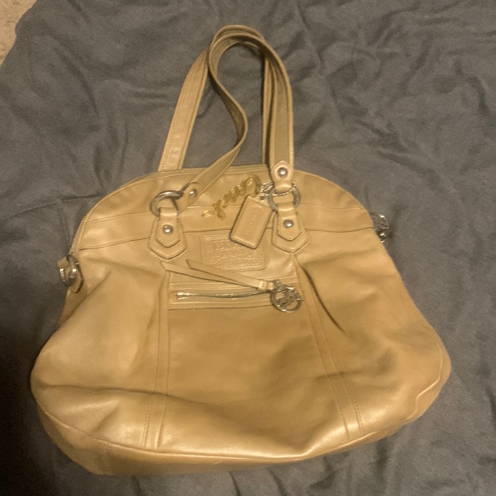 Tan leather Coach purse